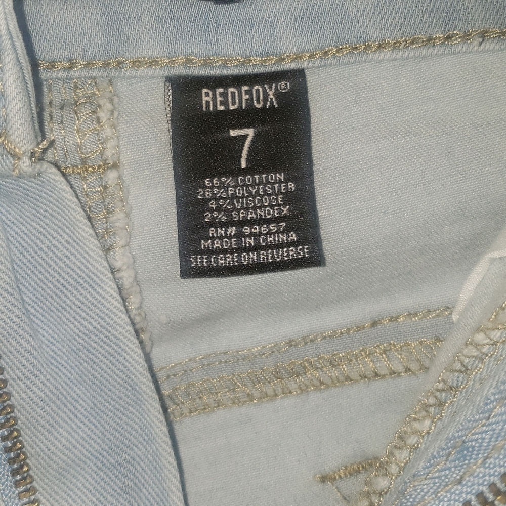 Light powder blue ripped jeans